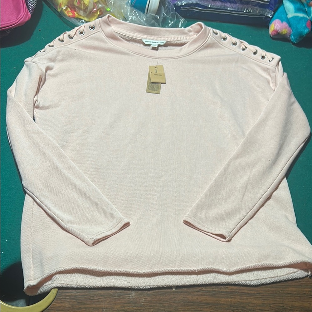 Pink Long Sleeve Top with Grommet Detail
